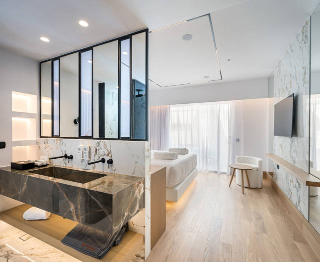 Ethereal White Resort Heraklion Junior Suite washbasins and the room in the background