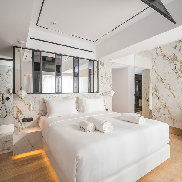 Ethereal White Resort Heraklion Luxury Suite decorated double bed