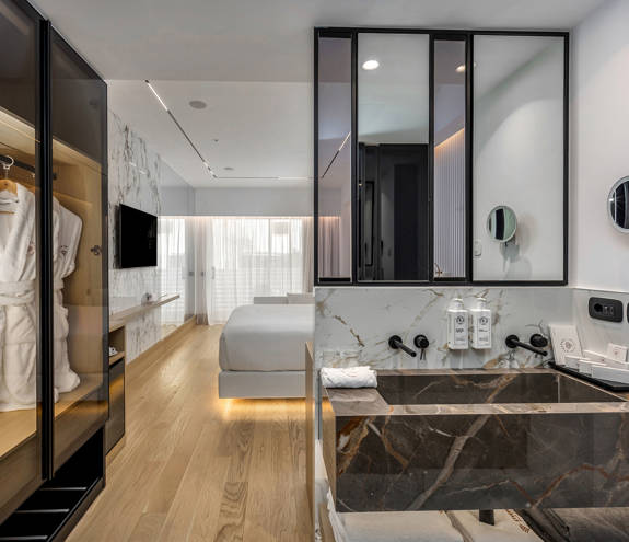Ethereal White Resort Heraklion Deluxe Suite washbasins and wardrobe