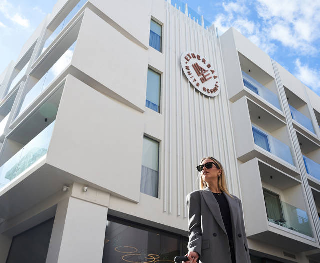 Person in front of the Ethereal White Resort Heraklion