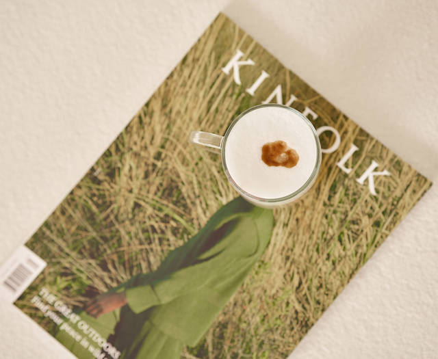 Ethereal White Resort Heraklion cup of coffee on a magazine