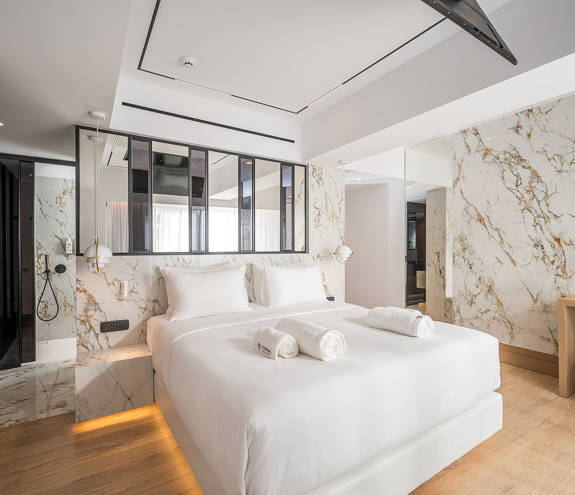 Ethereal White Resort Heraklion Luxury Suite decorated double bed