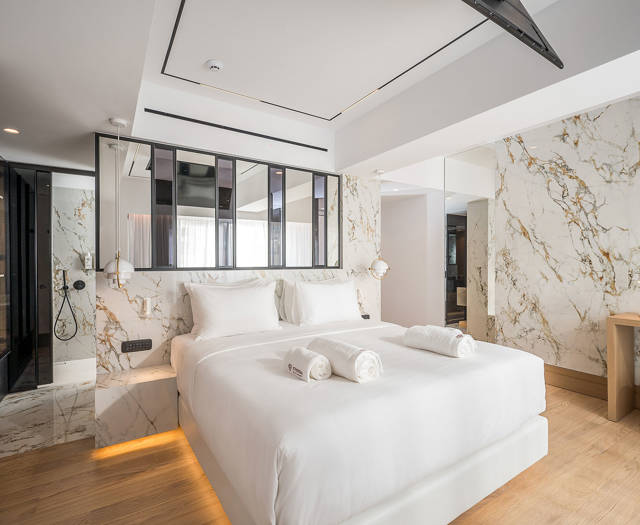 Ethereal White Resort Heraklion Luxury Suite decorated double bed