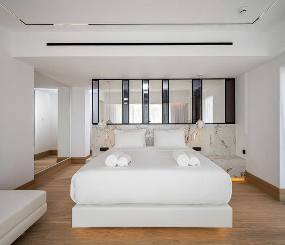 Ethereal White Resort Heraklion Luxury Suite decorated double bed