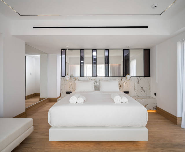 Ethereal White Resort Heraklion Luxury Suite decorated double bed