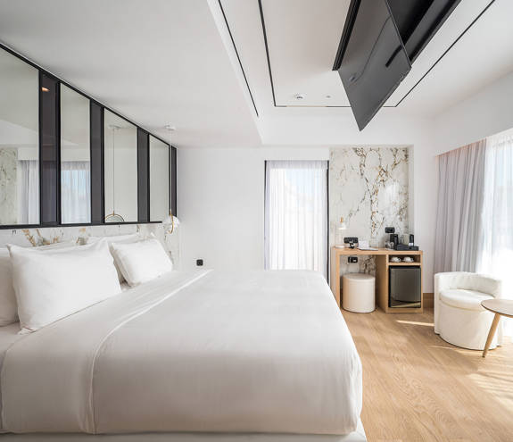 Ethereal White Resort Heraklion Luxury Suite double bed and bedroom