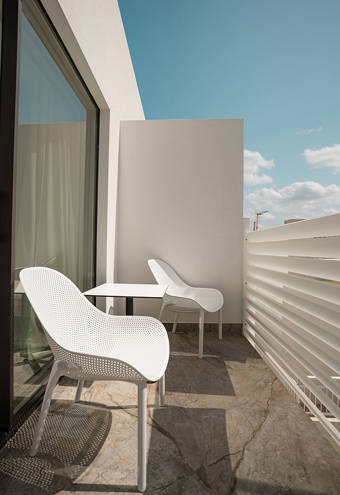 Ethereal White Resort Heraklion Deluxe Suite Swim Up balcony chairs and table