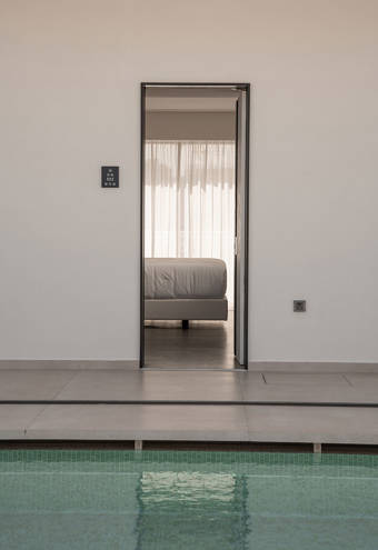 Ethereal White Resort Heraklion Deluxe Suite Swim Up pool and room entrance